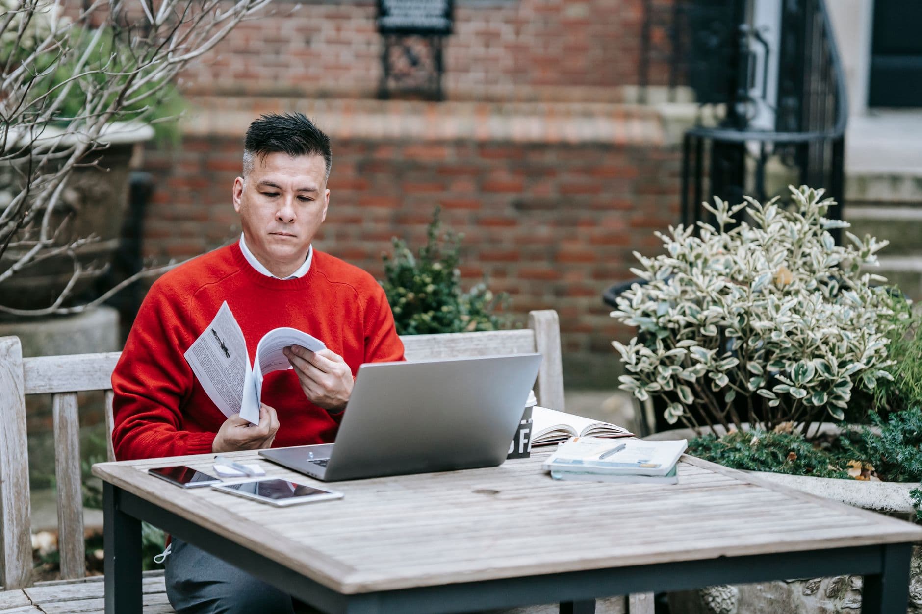 Online seller reviewing sales dashboards on a laptop at a desk