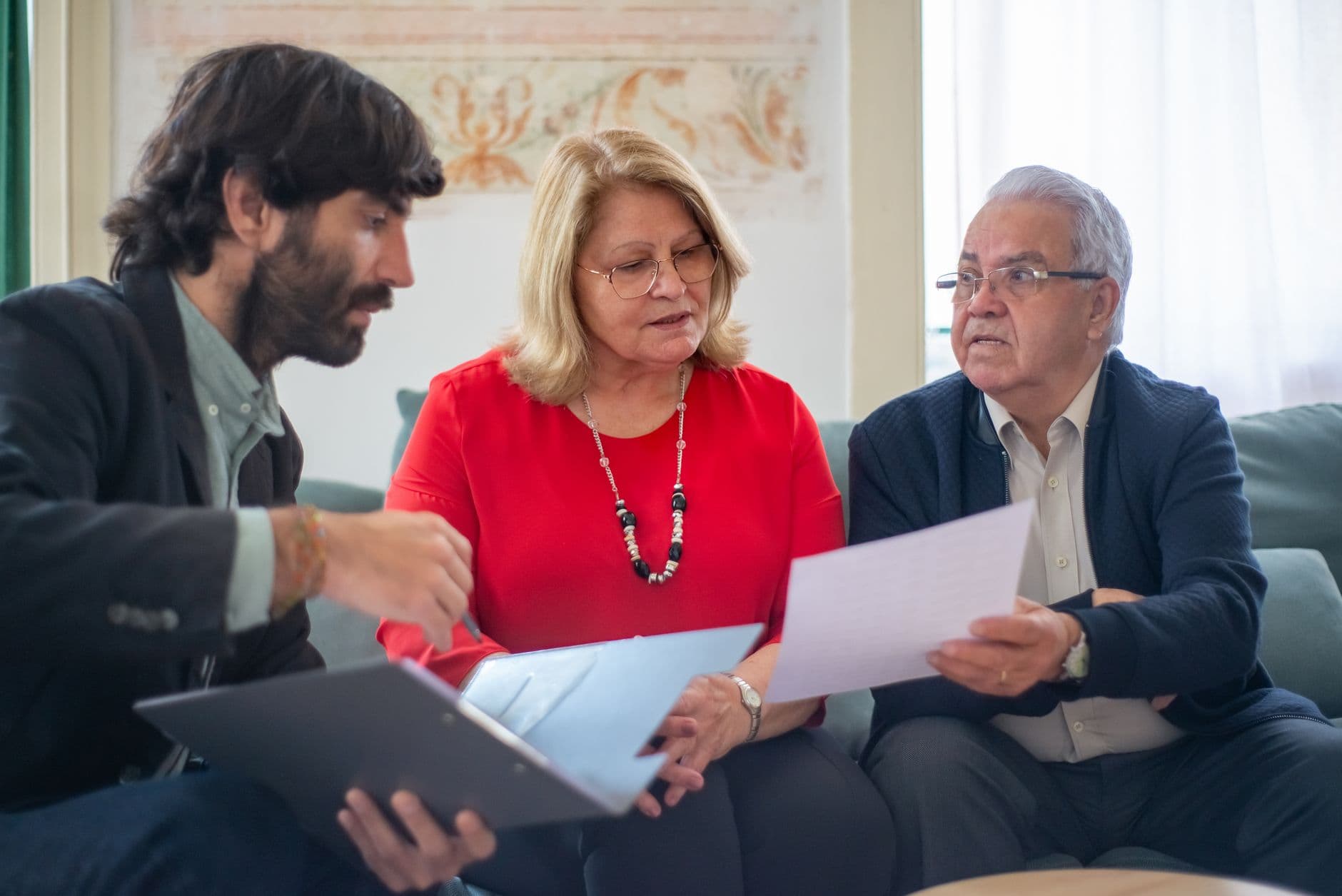 Advisor and family reviewing multi-entity financial statements together
