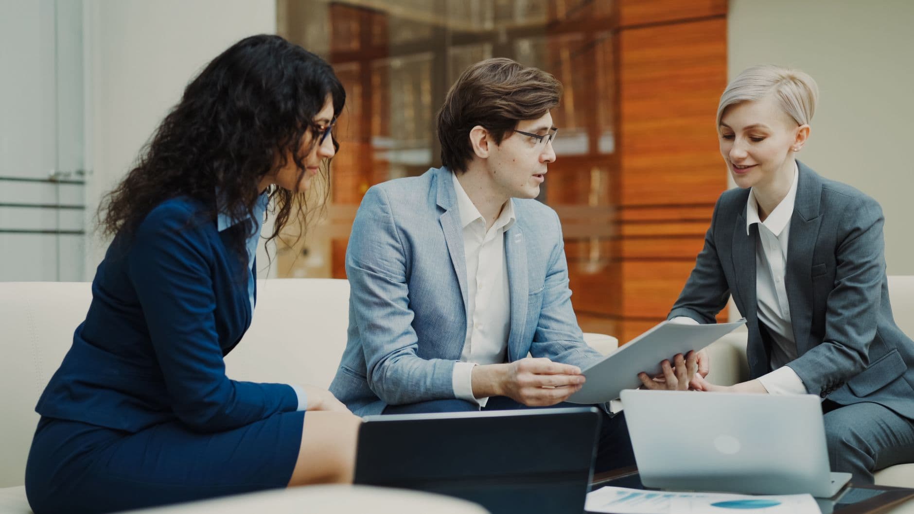 Accountant and business owner reviewing quarterly tax planning documents together